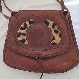 Hand made Brown Leather & Leopard skin Bag. Measures 11x12"